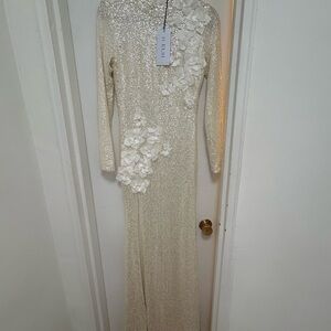 Elegant Sequin Gown with Floral Appliqué